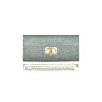 silver straw clutch bag with a bamboo clasp and chain strap on a white background