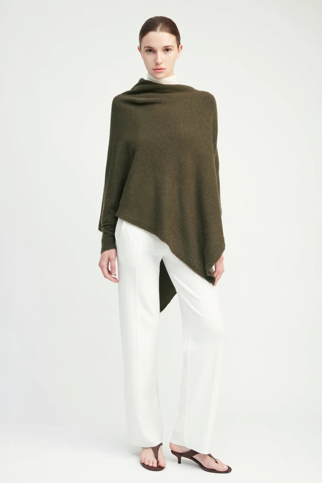 Khaki triangle poncho with sleeves, worn view